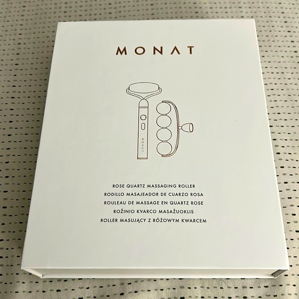 Rose quartz massaging roller by Monat